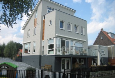 Verbouw en uitbreiding dijkwoning te Rotterdam